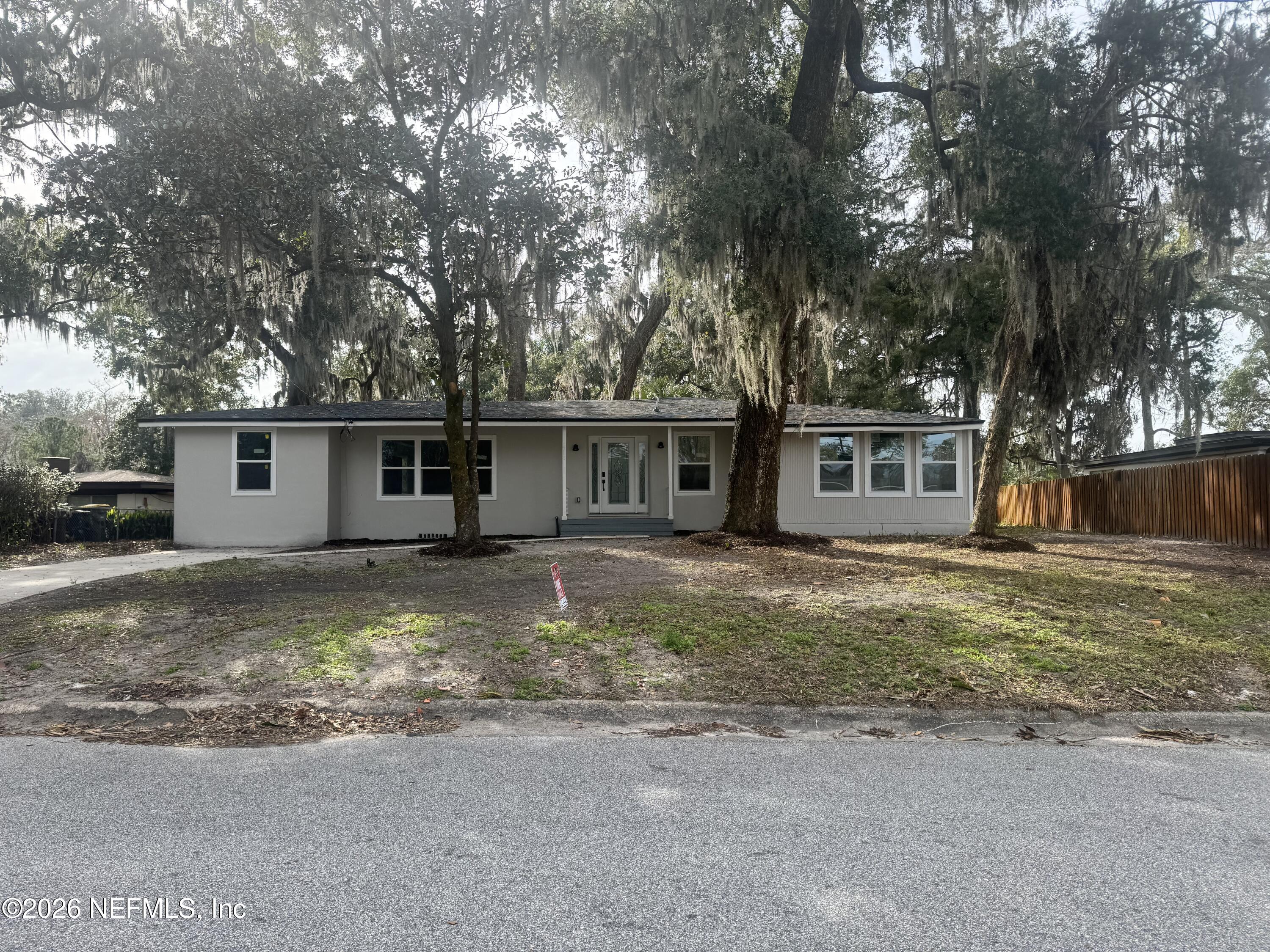 1718 Cornell Road Jacksonville, FL 32207 - Photo 2 of 41 front view of a house with a yard