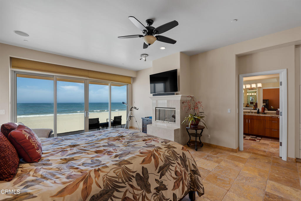 791 Mandalay Beach Road Oxnard, CA 93035 - Photo 28 of 46 a large bedroom with a bed and a large window with the outer view