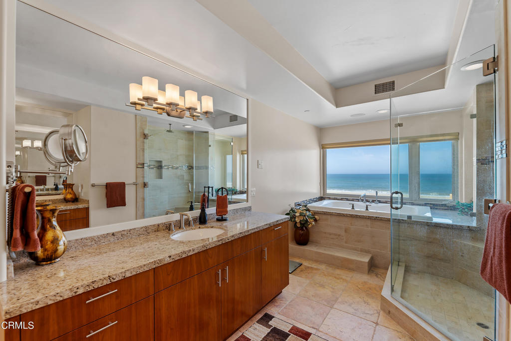 791 Mandalay Beach Road Oxnard, CA 93035 - Photo 30 of 46 a bathroom with a sink double vanity and a mirror