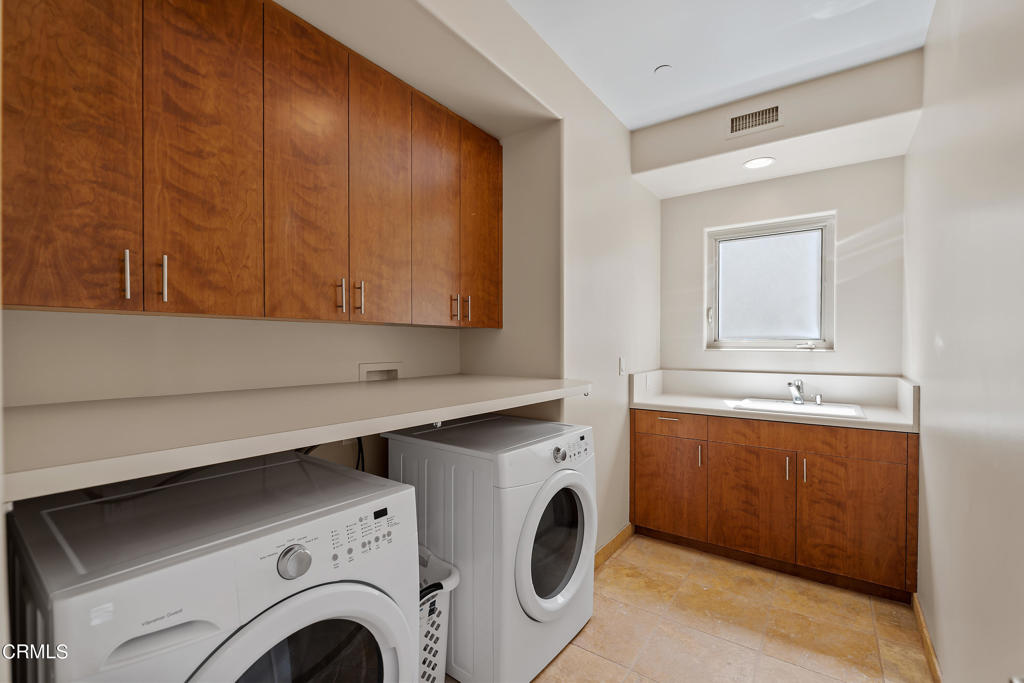 791 Mandalay Beach Road Oxnard, CA 93035 - Photo 32 of 46 a utility room with dryer and washer