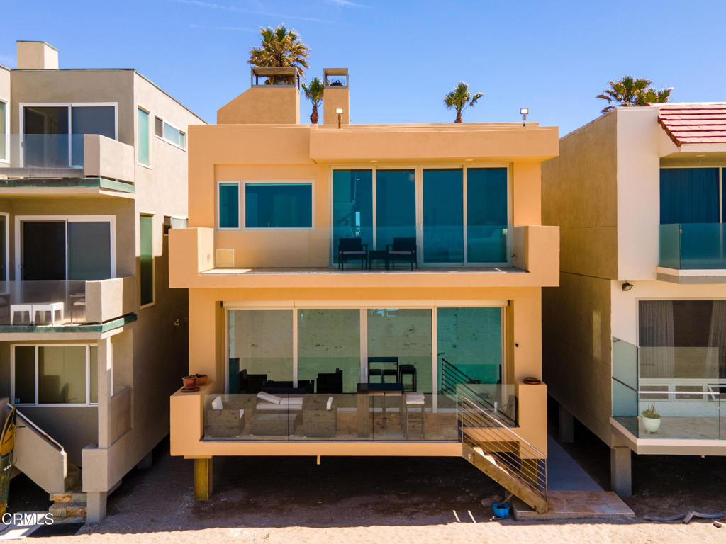791 Mandalay Beach Road Oxnard, CA 93035 - Photo 45 of 46 a view of a building with a porch