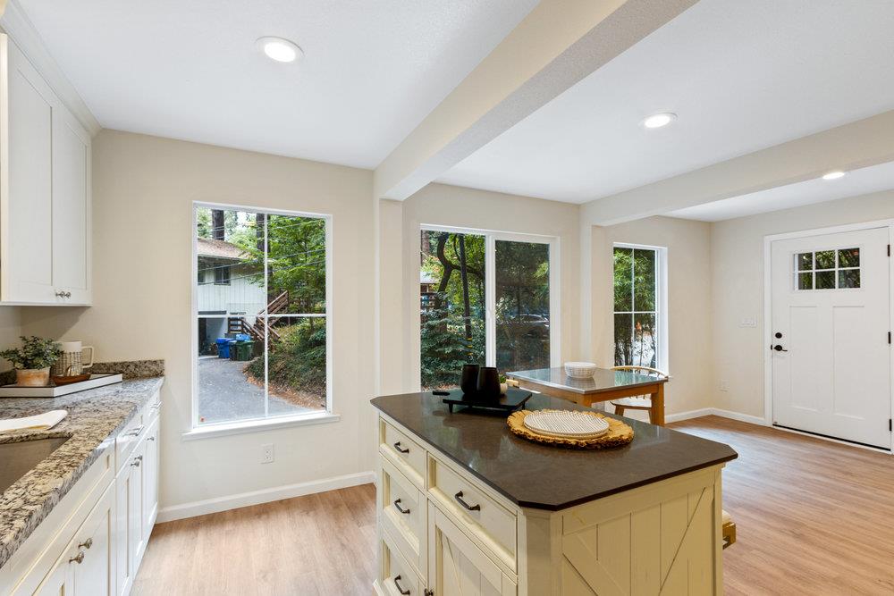 35 Park Way Mount Hermon, CA 95041 - Photo 13 of 46 a kitchen with a stove a sink a counter space and wooden floor