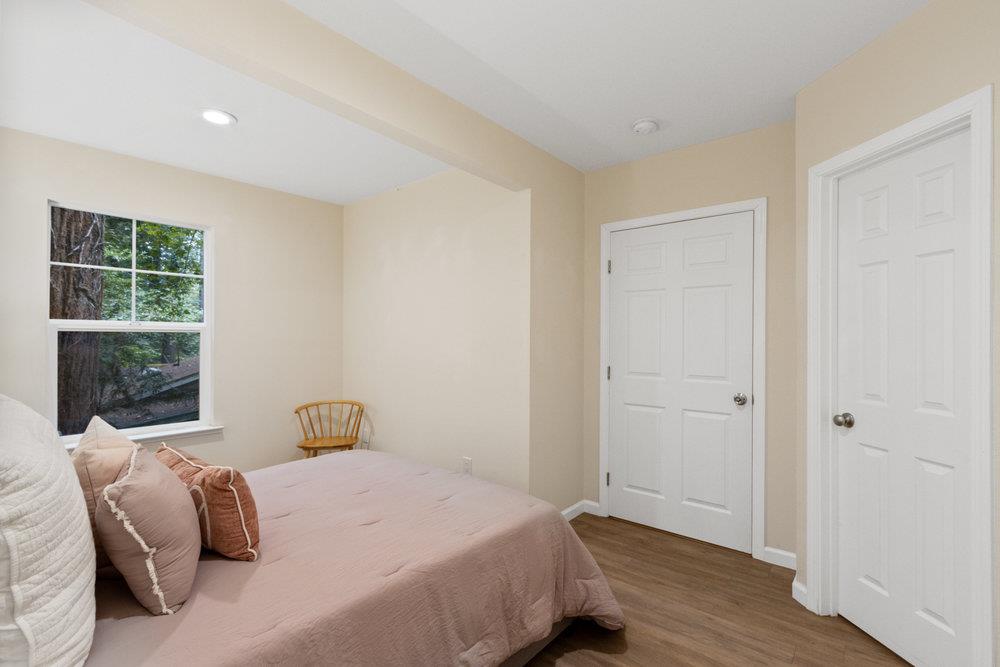 35 Park Way Mount Hermon, CA 95041 - Photo 17 of 46 a bedroom with a bed and wooden floor