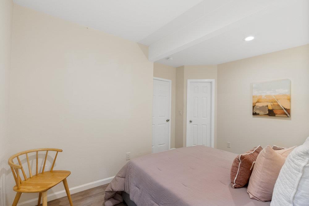 35 Park Way Mount Hermon, CA 95041 - Photo 18 of 46 a bedroom with a bed and a chair