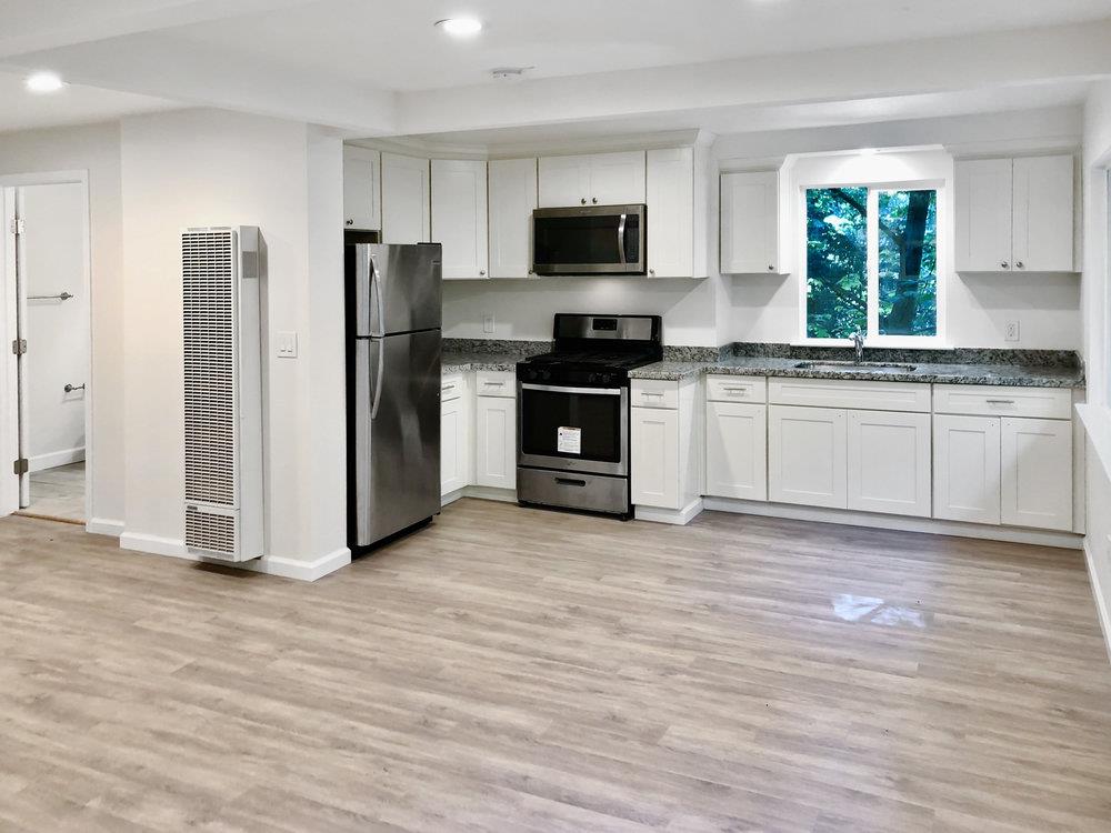 35 Park Way Mount Hermon, CA 95041 - Photo 29 of 46 a kitchen with stainless steel appliances granite countertop a stove a sink and a refrigerator