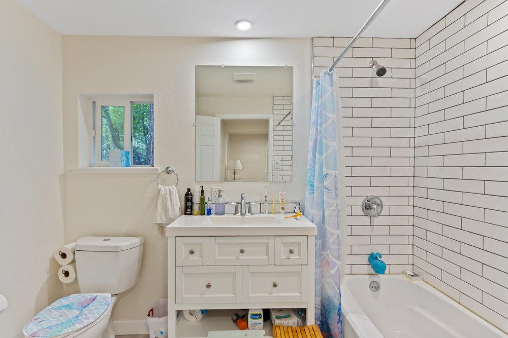 35 Park Way Mount Hermon, CA 95041 - Photo 32 of 46 a bathroom with a sink toilet vanity tub and shower