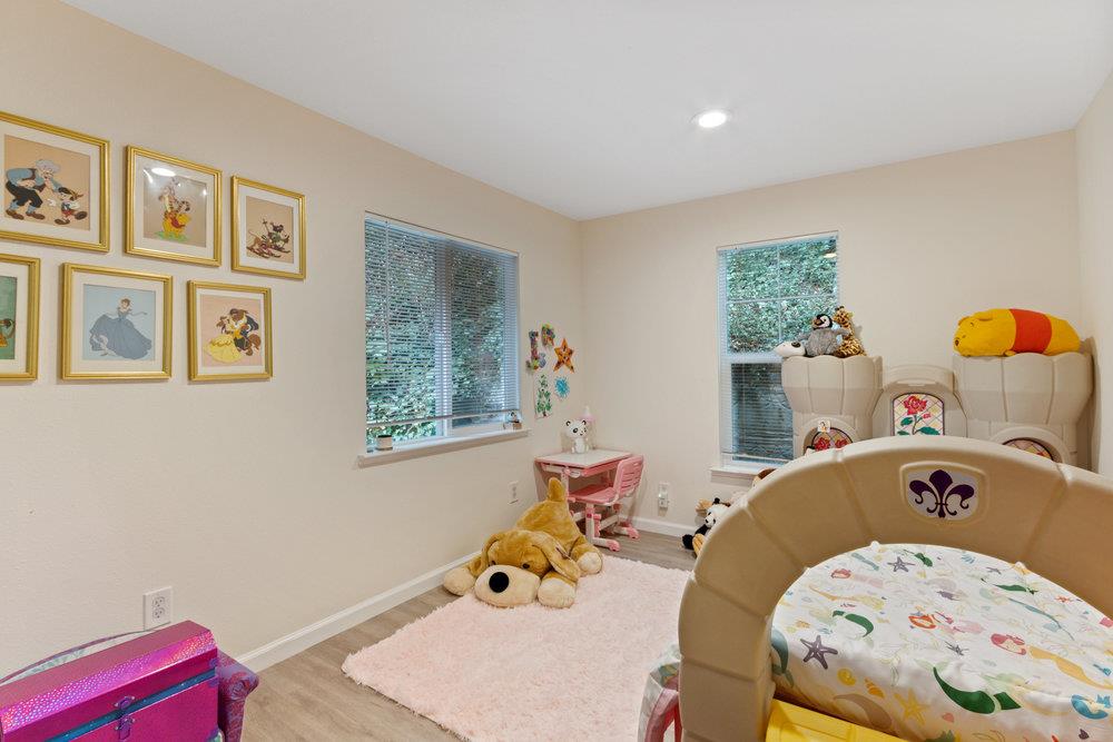 35 Park Way Mount Hermon, CA 95041 - Photo 34 of 46 a bedroom with a bed and wooden floor