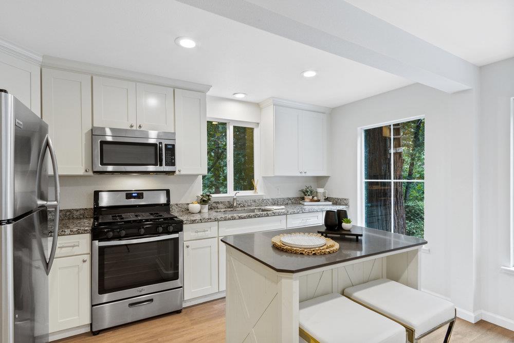 35 Park Way Mount Hermon, CA 95041 - Photo 10 of 46 a kitchen with a sink a stove a refrigerator and cabinets