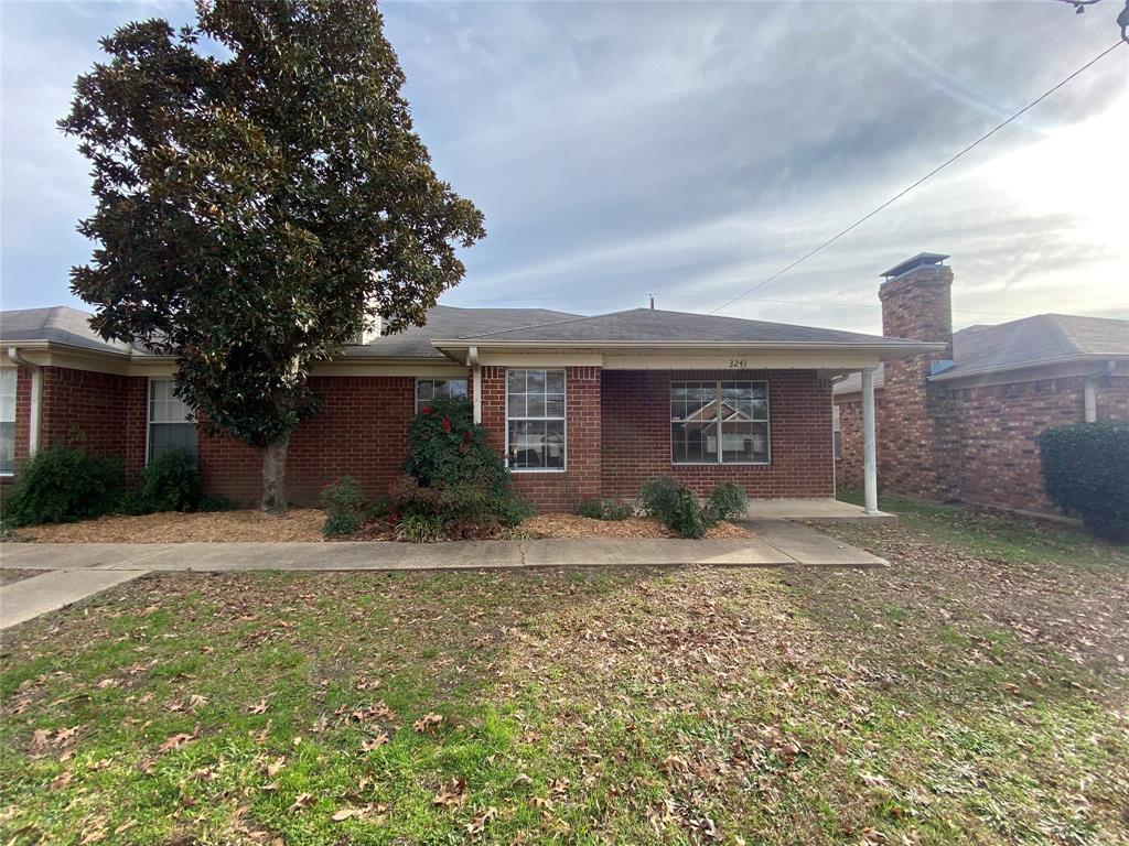 3241 Lexington Drive Tyler, TX 75701 - Photo 1 of 17 a view of a house with a yard and large tree