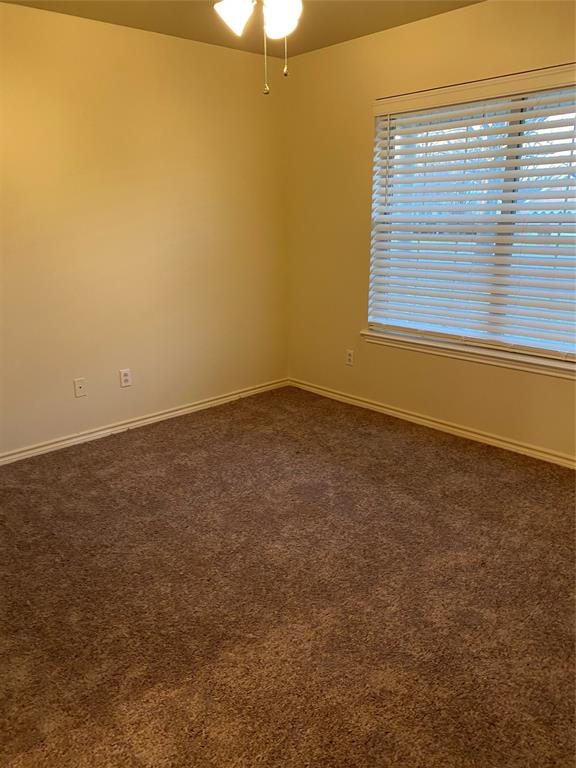 3241 Lexington Drive Tyler, TX 75701 - Photo 15 of 17 an empty room with a window
