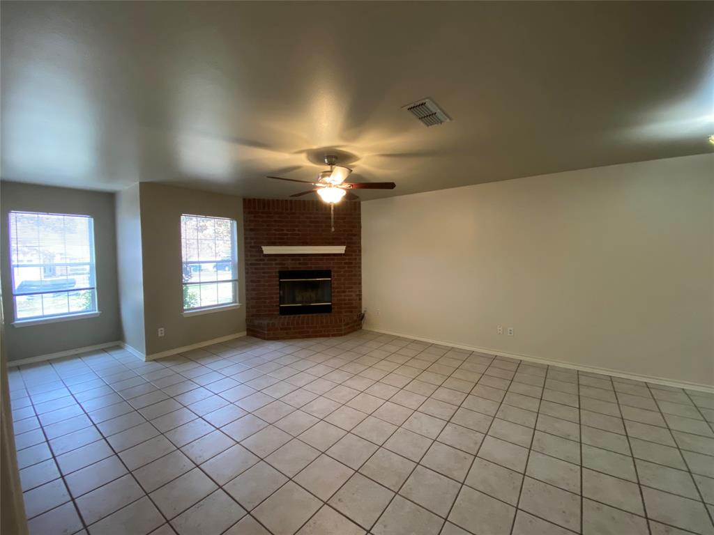 3241 Lexington Drive Tyler, TX 75701 - Photo 6 of 17 a view of an empty room with a window
