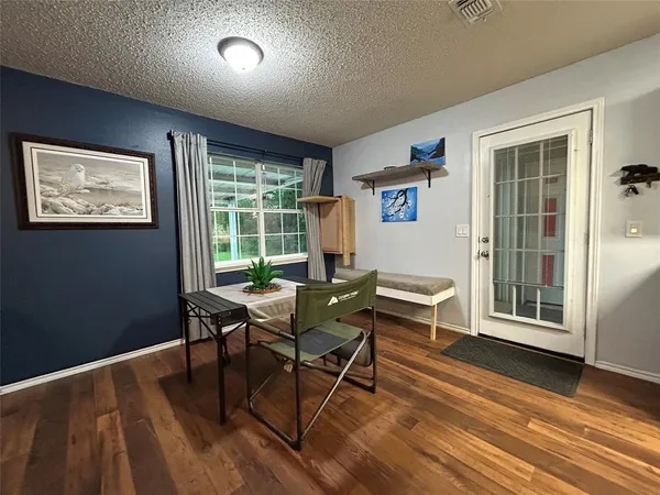 a workspace with wooden floor