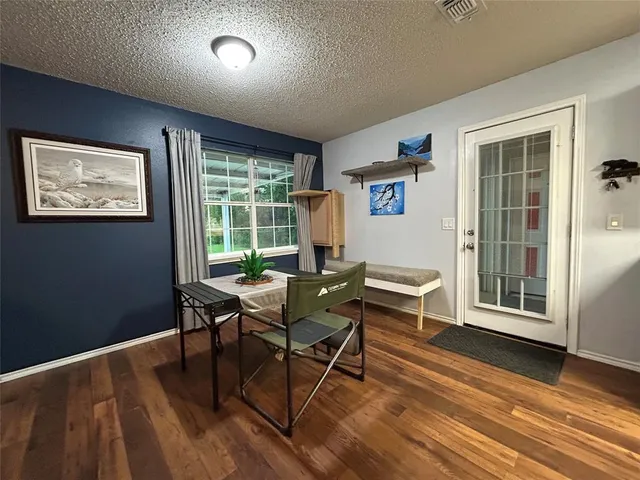 a workspace with wooden floor