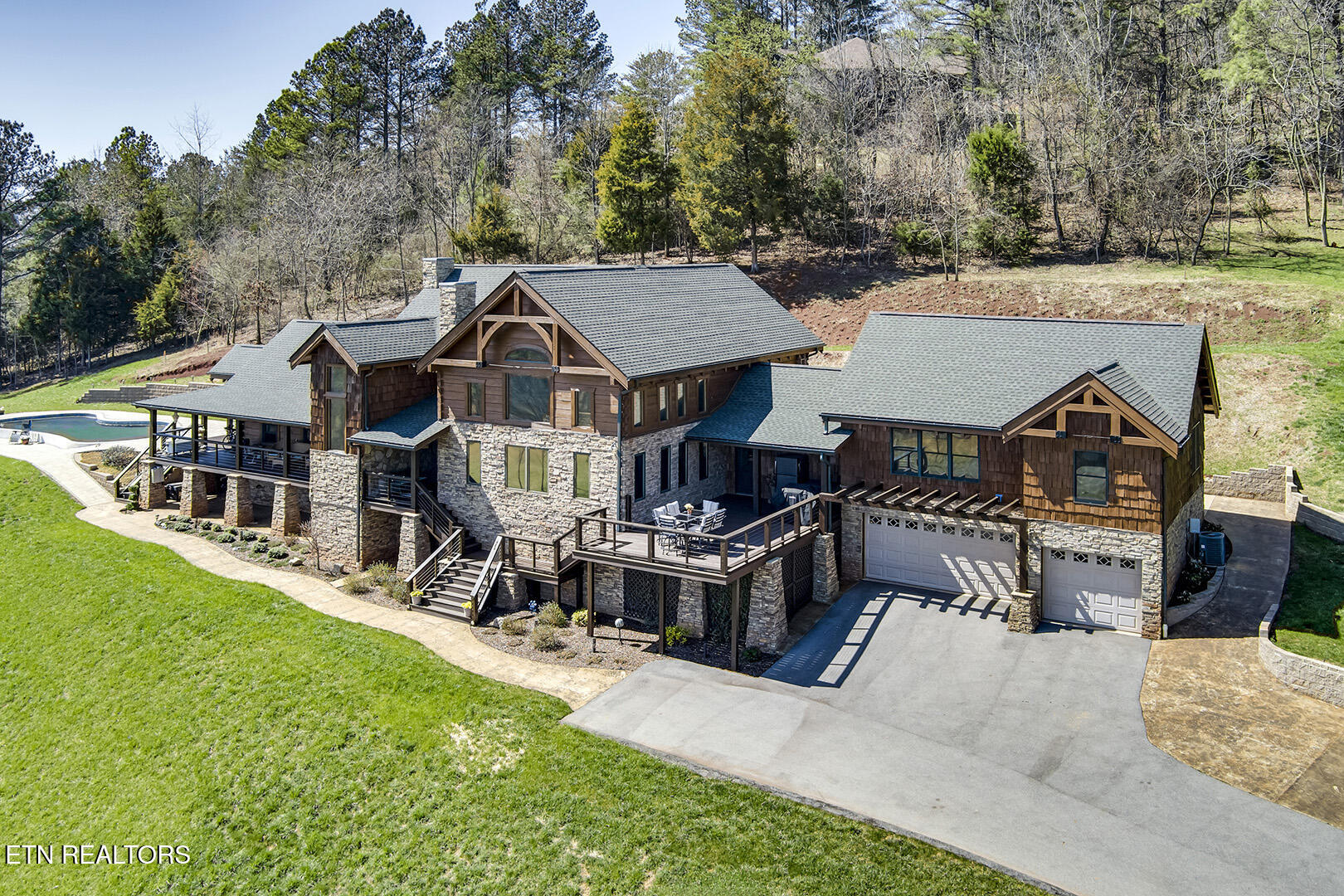 124 Overlook Way Vonore, TN 37885 - Photo 2 of 60 02_OverlookWay_124_FrontRightElevated