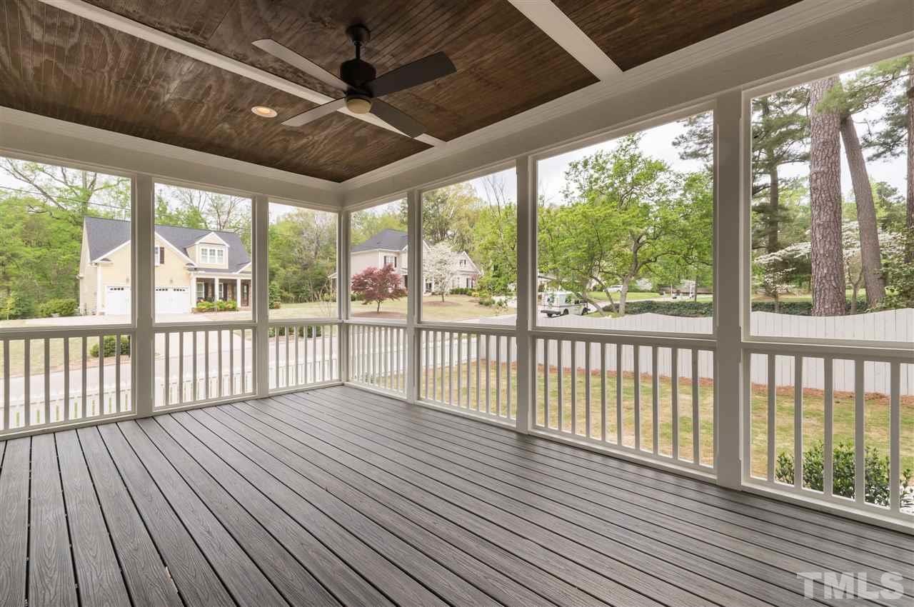 3201 Plantation Road Raleigh, NC 27609 - Photo 22 of 25 a view of a balcony with wooden floor