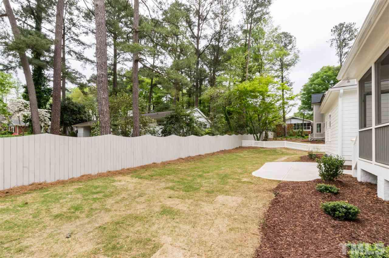 3201 Plantation Road Raleigh, NC 27609 - Photo 23 of 25 a view of swimming pool with large trees
