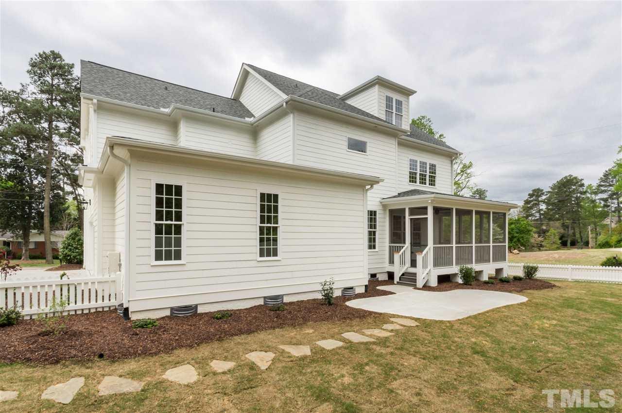 3201 Plantation Road Raleigh, NC 27609 - Photo 24 of 25 a view of a yard with a house and sitting area