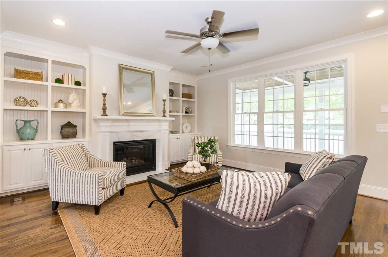 3201 Plantation Road Raleigh, NC 27609 - Photo 6 of 25 a living room with furniture fireplace and window