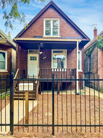 a front view of a house with a porch