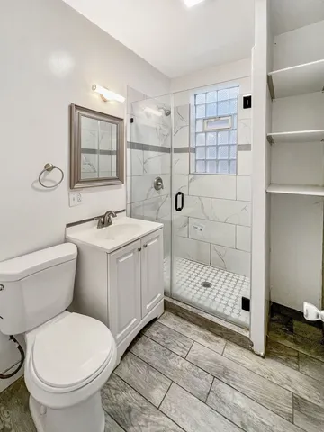 a kitchen with refrigerator a stove a sink and a microwave