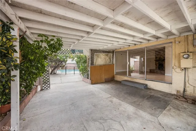 a view of a room with a lot of trees