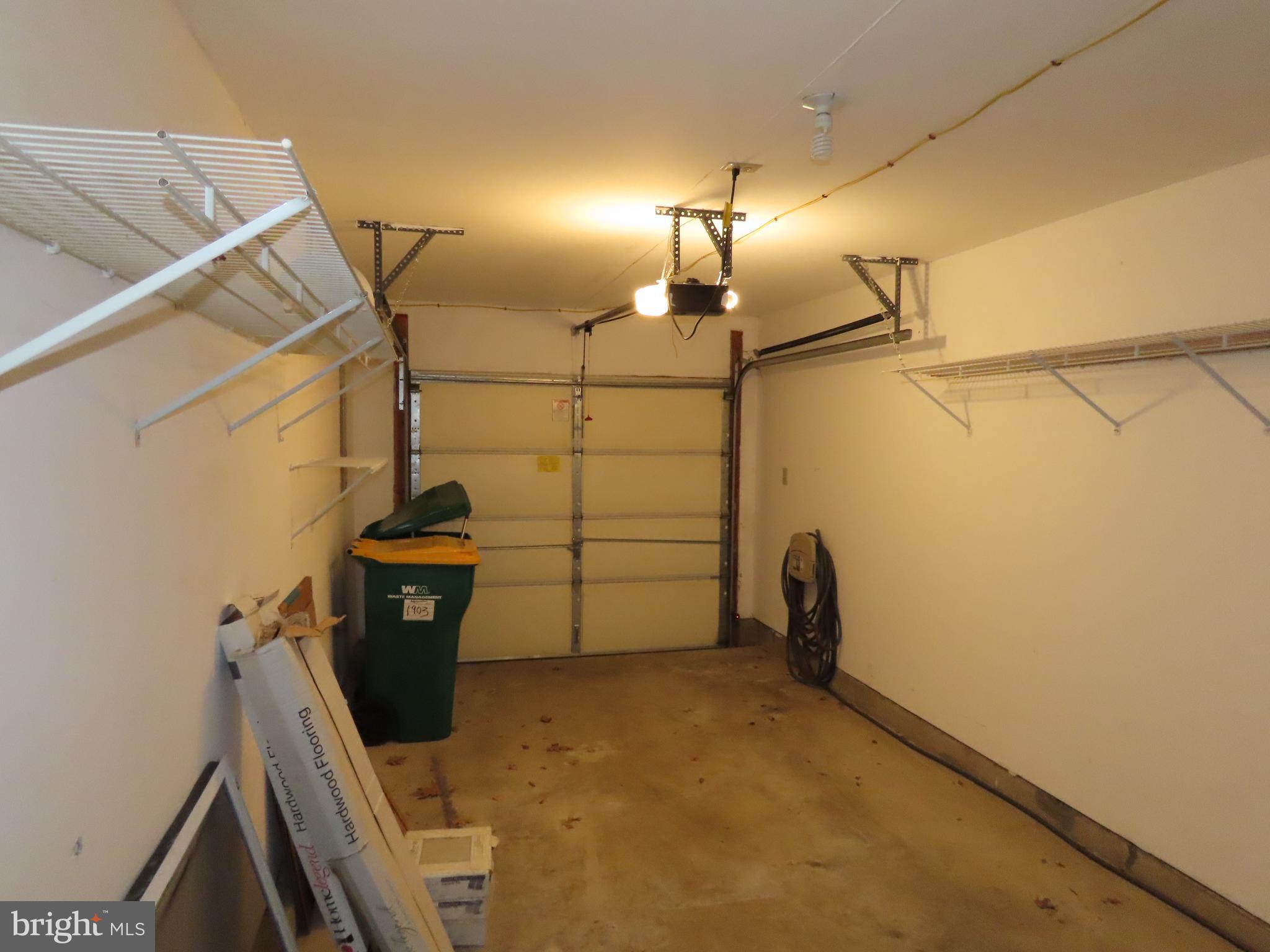 1903 Waterford Road, Unit 34 Yardley, PA 19067 - Photo 14 of 14 a view of a room with racks on the wall