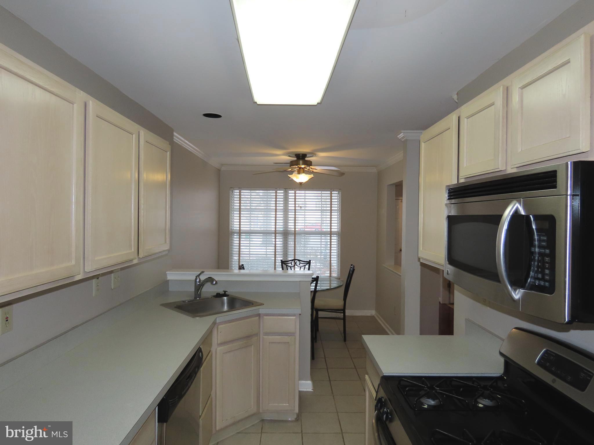 1903 Waterford Road, Unit 34 Yardley, PA 19067 - Photo 2 of 14 a room with a table chairs and entryway