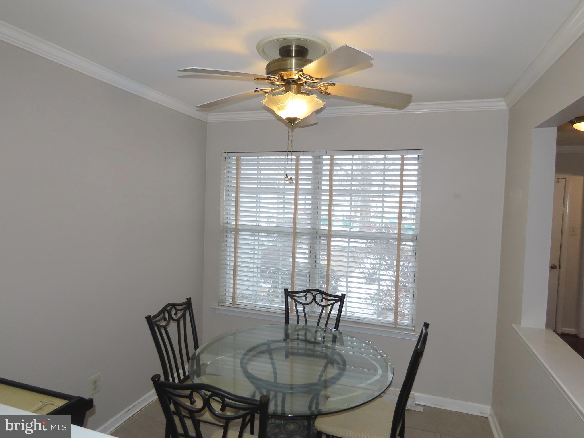 1903 Waterford Road, Unit 34 Yardley, PA 19067 - Photo 3 of 14 a dining room with furniture and window