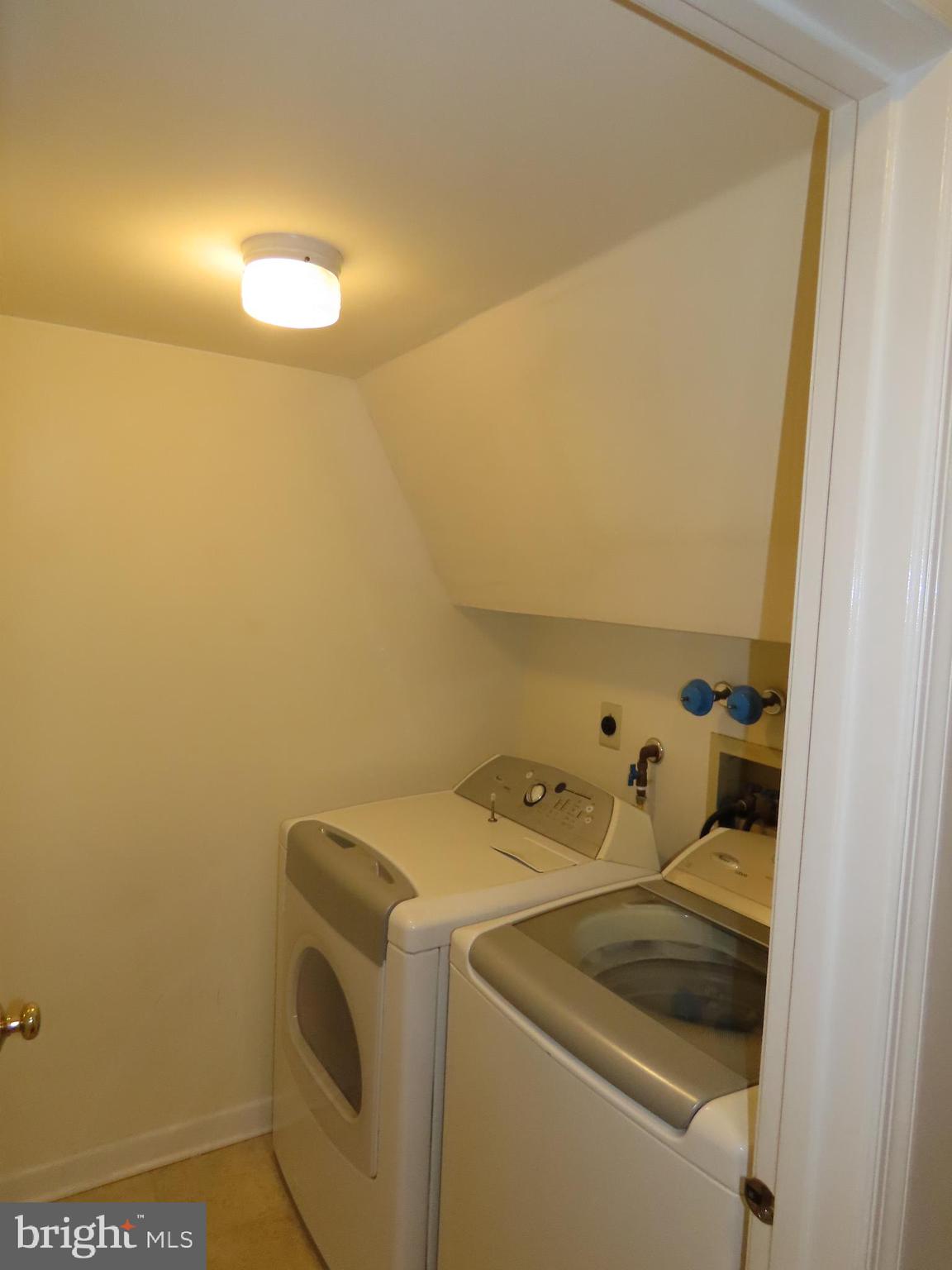 1903 Waterford Road, Unit 34 Yardley, PA 19067 - Photo 8 of 14 a utility room with dryer and washer