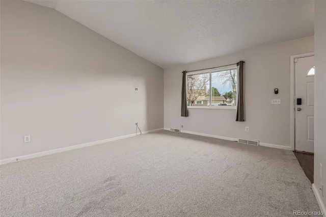 an empty room with a window