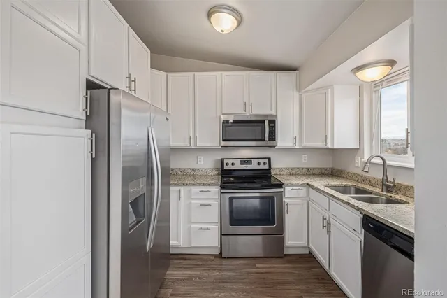 a view of a house with snow on the road