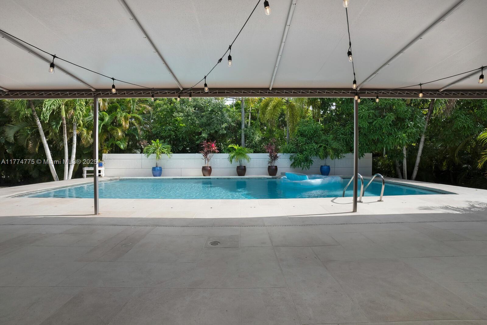1523 Blue Road Coral Gables, FL 33146 - Photo 20 of 26 a house view with a outdoor space
