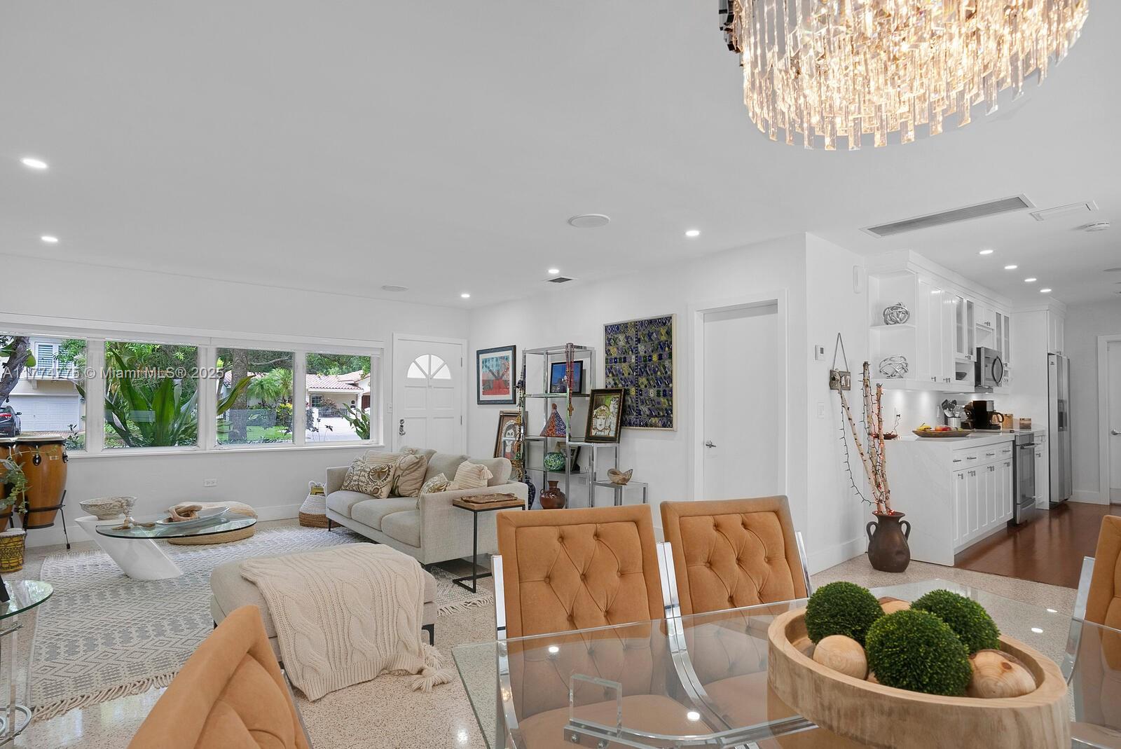 1523 Blue Road Coral Gables, FL 33146 - Photo 8 of 26 a living room with furniture and a large window