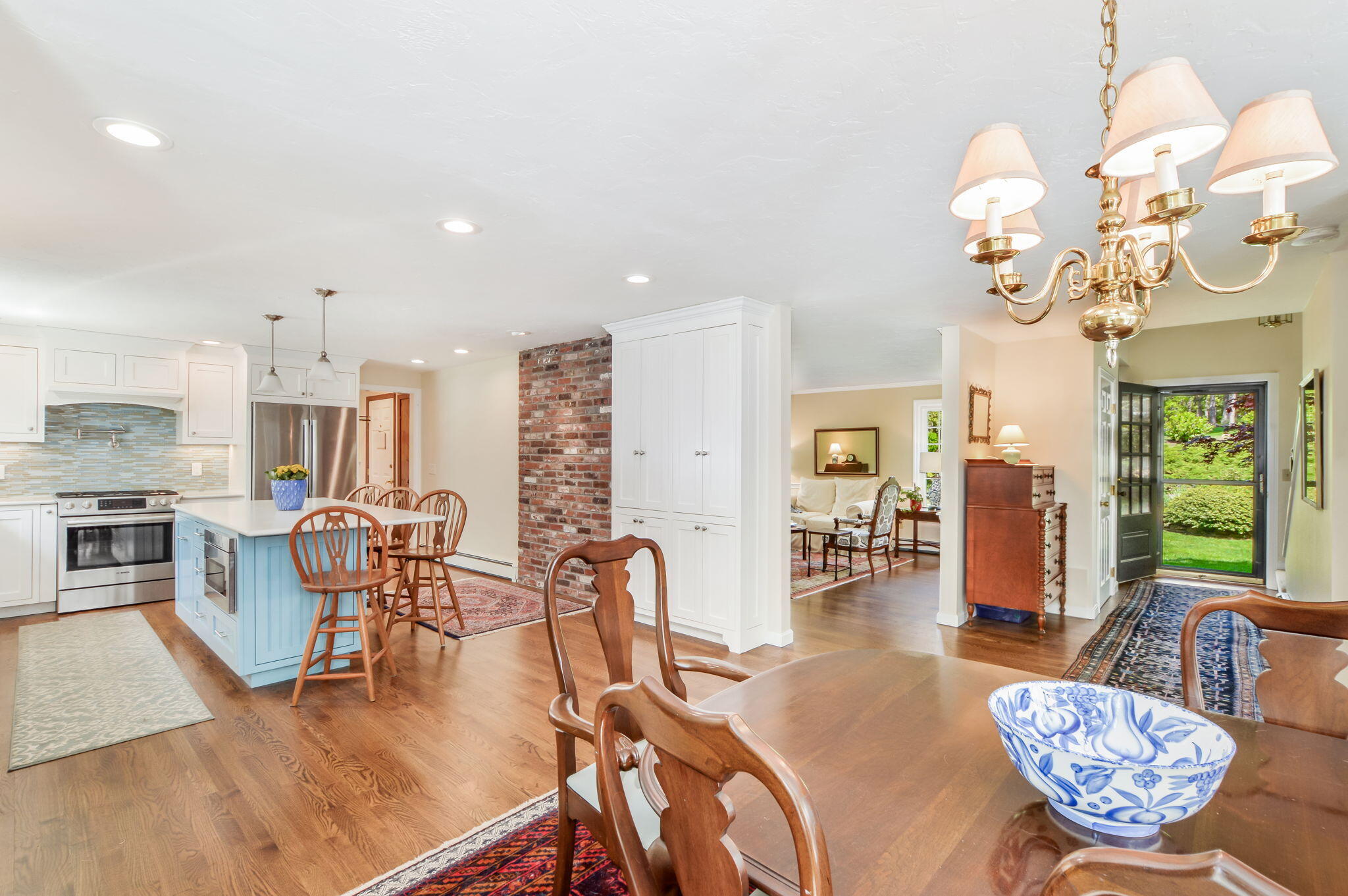 290 Cotuit Bay Drive Cotuit, MA 02635 - Photo 13 of 55 a view of a dining room with furniture window and wooden floor