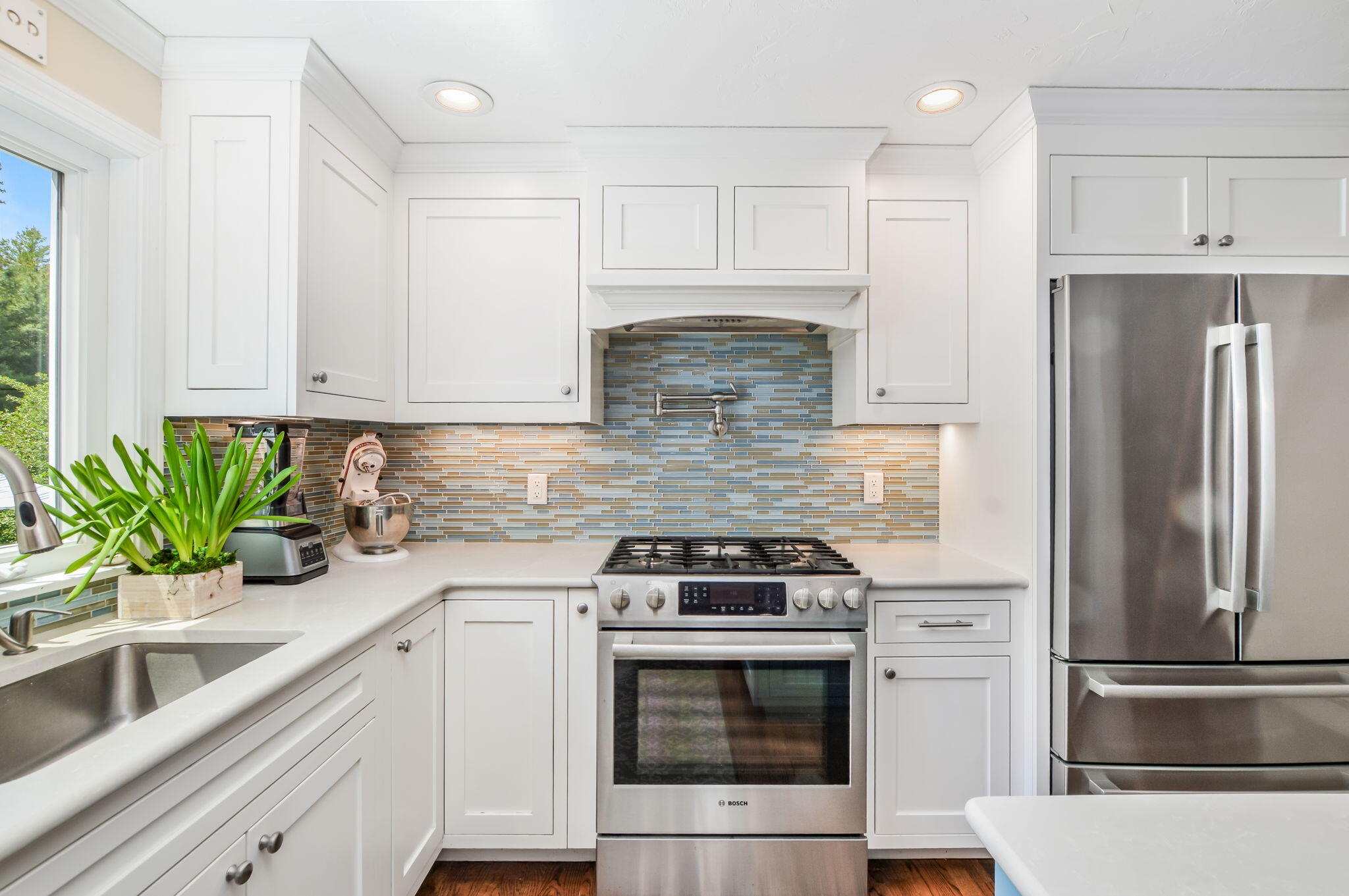 290 Cotuit Bay Drive Cotuit, MA 02635 - Photo 16 of 55 a kitchen with a refrigerator and a sink