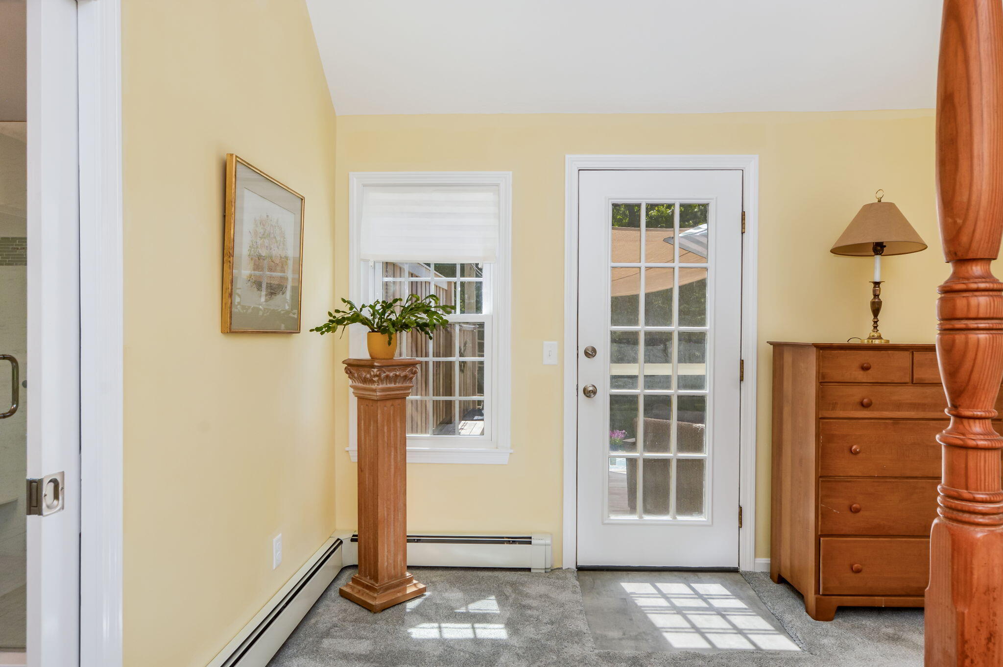 290 Cotuit Bay Drive Cotuit, MA 02635 - Photo 24 of 55 a view of a hallway with windows and entryway