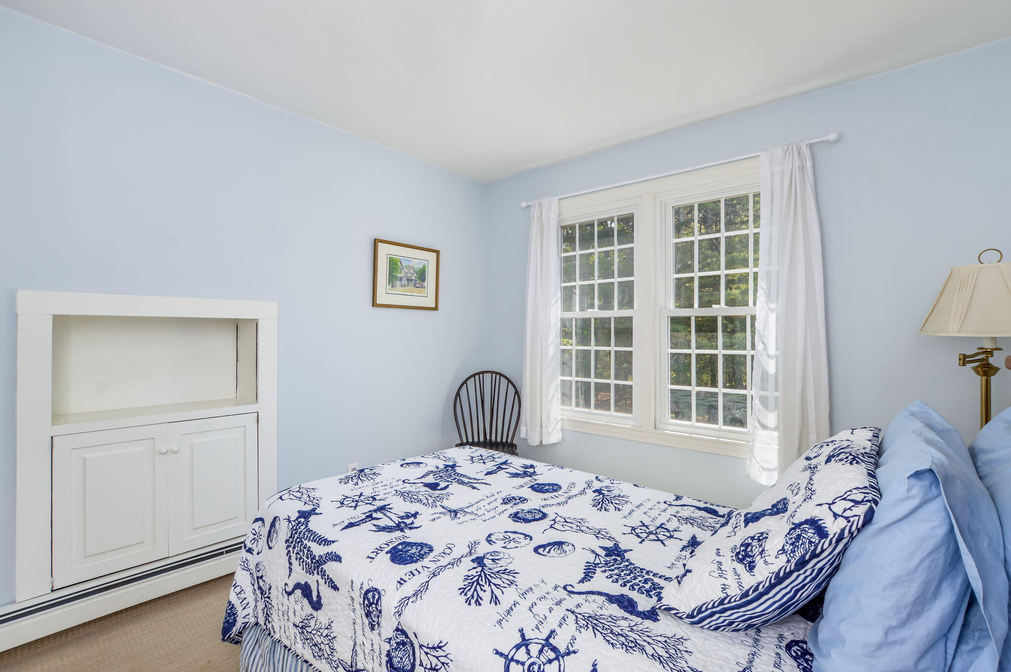 290 Cotuit Bay Drive Cotuit, MA 02635 - Photo 29 of 55 a bedroom with a bed and a window with chair