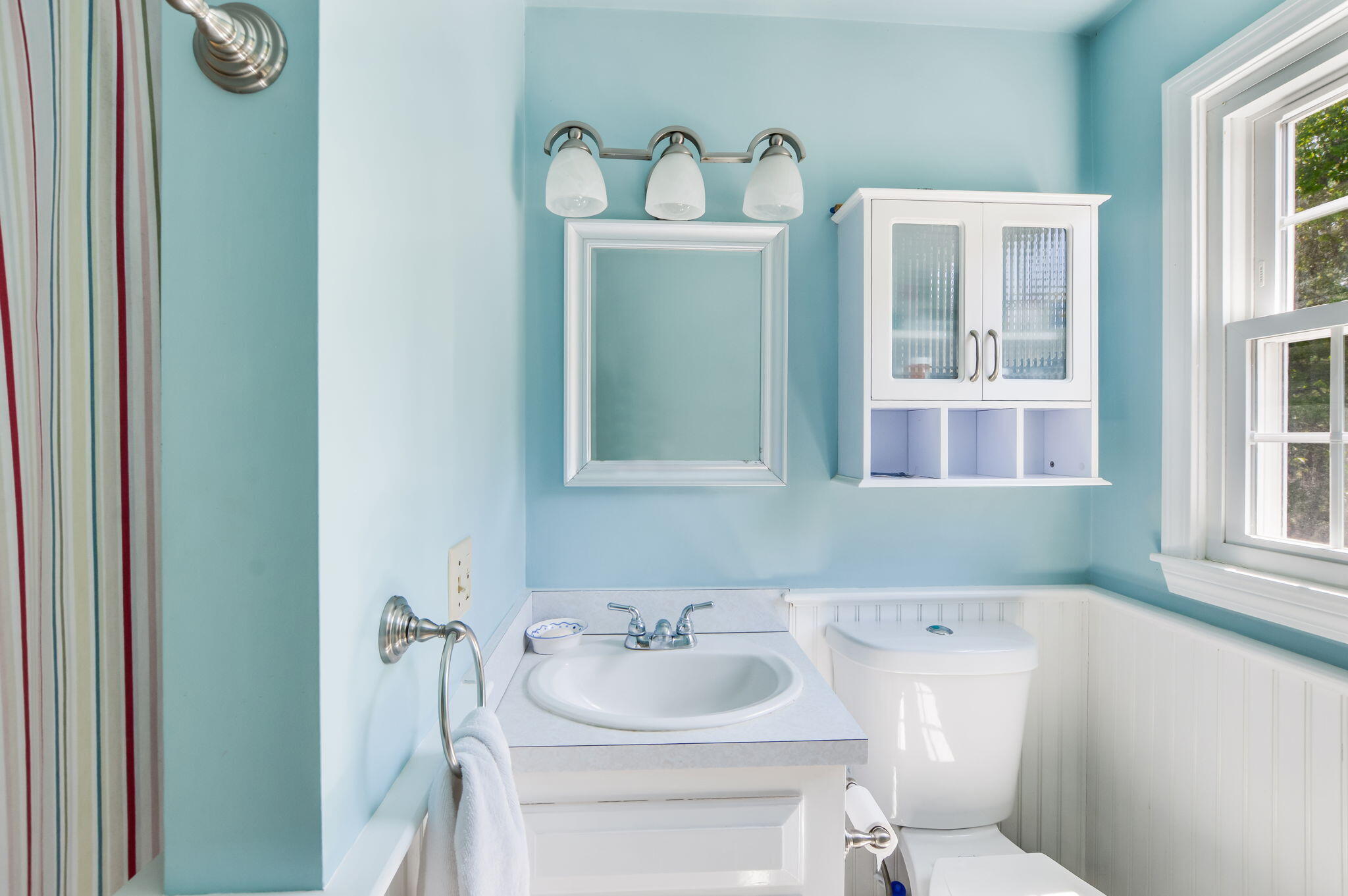 290 Cotuit Bay Drive Cotuit, MA 02635 - Photo 32 of 55 a bathroom with a sink and a mirror