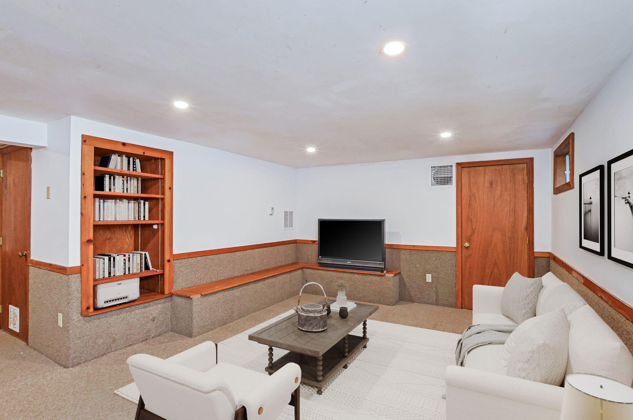 290 Cotuit Bay Drive Cotuit, MA 02635 - Photo 33 of 55 a living room with furniture and a flat screen tv
