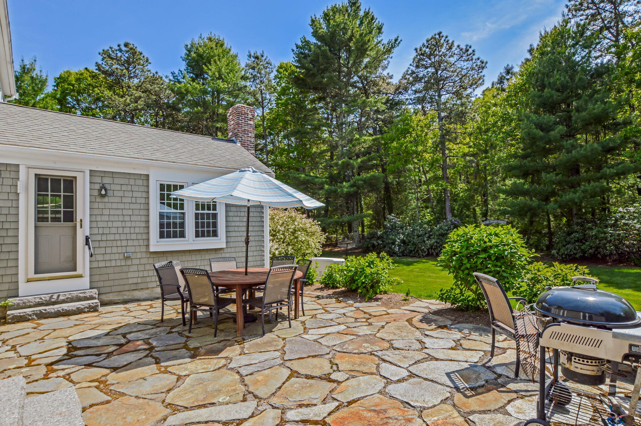 290 Cotuit Bay Drive Cotuit, MA 02635 - Photo 38 of 55 a view of a house with backyard and sitting area