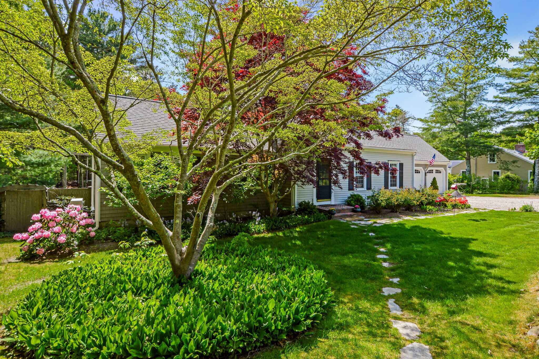290 Cotuit Bay Drive Cotuit, MA 02635 - Photo 43 of 55 a front view of a house with garden