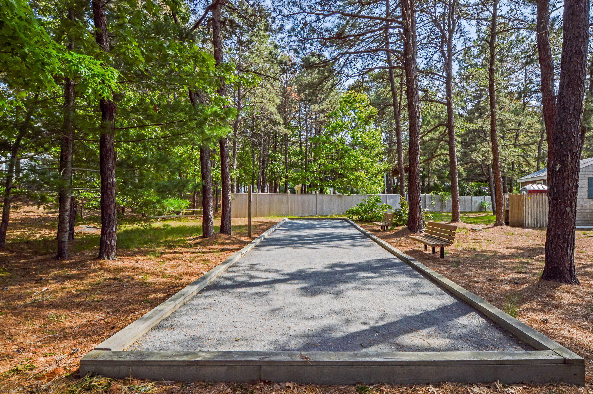 290 Cotuit Bay Drive Cotuit, MA 02635 - Photo 50 of 55 a view of a backyard with large trees