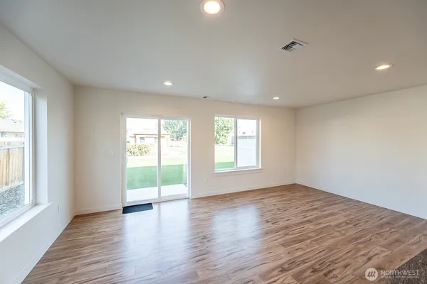 a view of kitchen with wooden floor