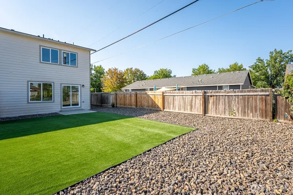a view of a backyard with a garden