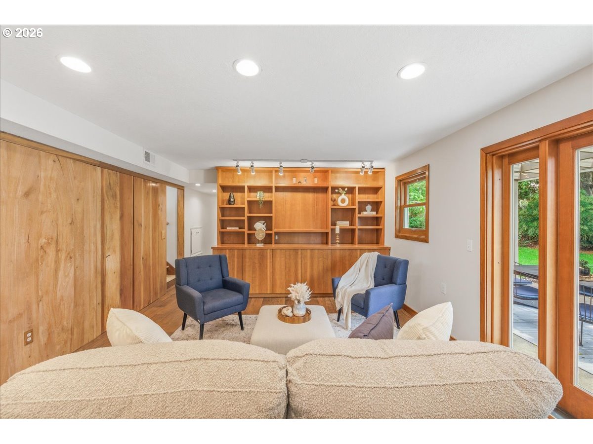 3130 Southwest 116th Avenue Beaverton, OR 97005 - Photo 27 of 44 a living room with furniture and a large window