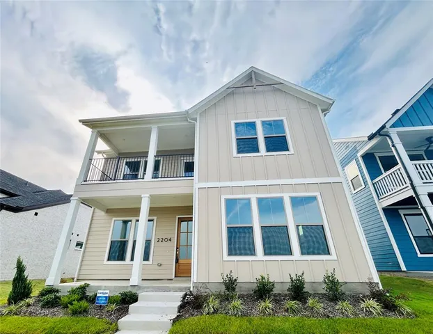 a front view of a multi story residential apartment building