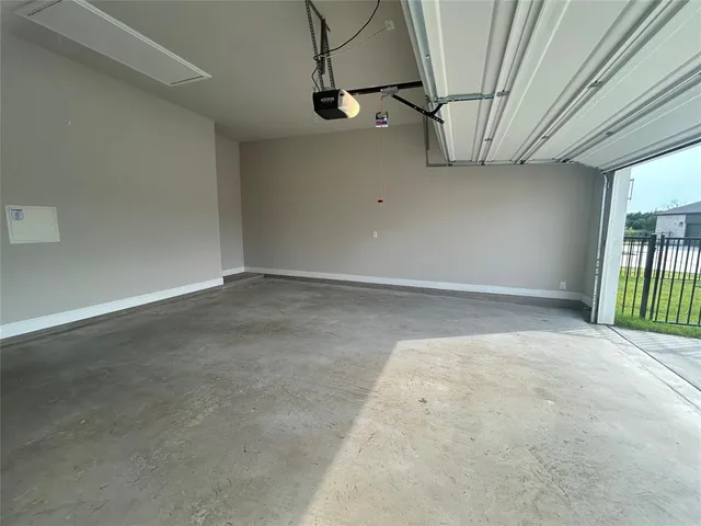 an empty room with staircase