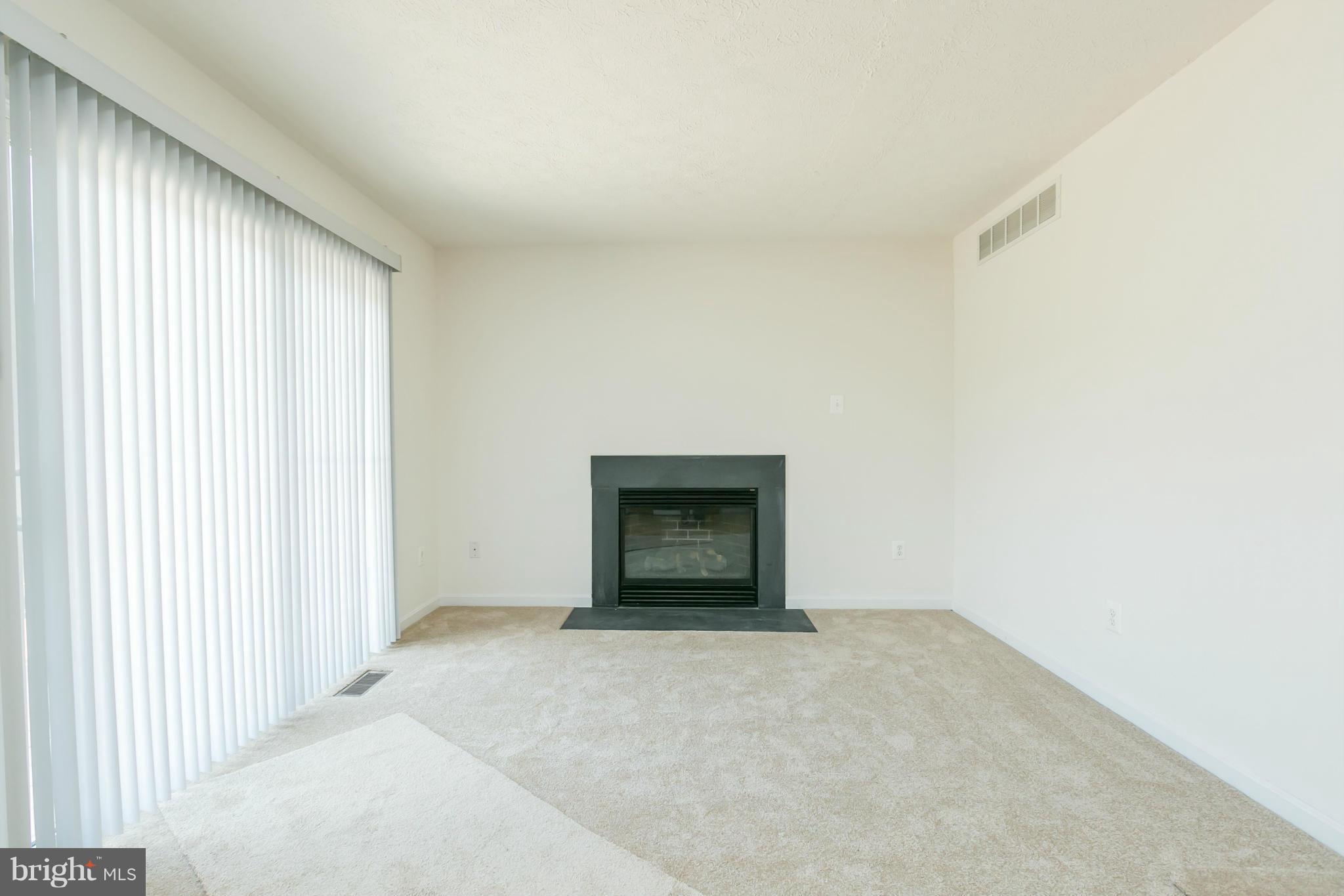 9302 Sea Point Road Baltimore, MD 21219 - Photo 11 of 30 a view of an empty room with a window