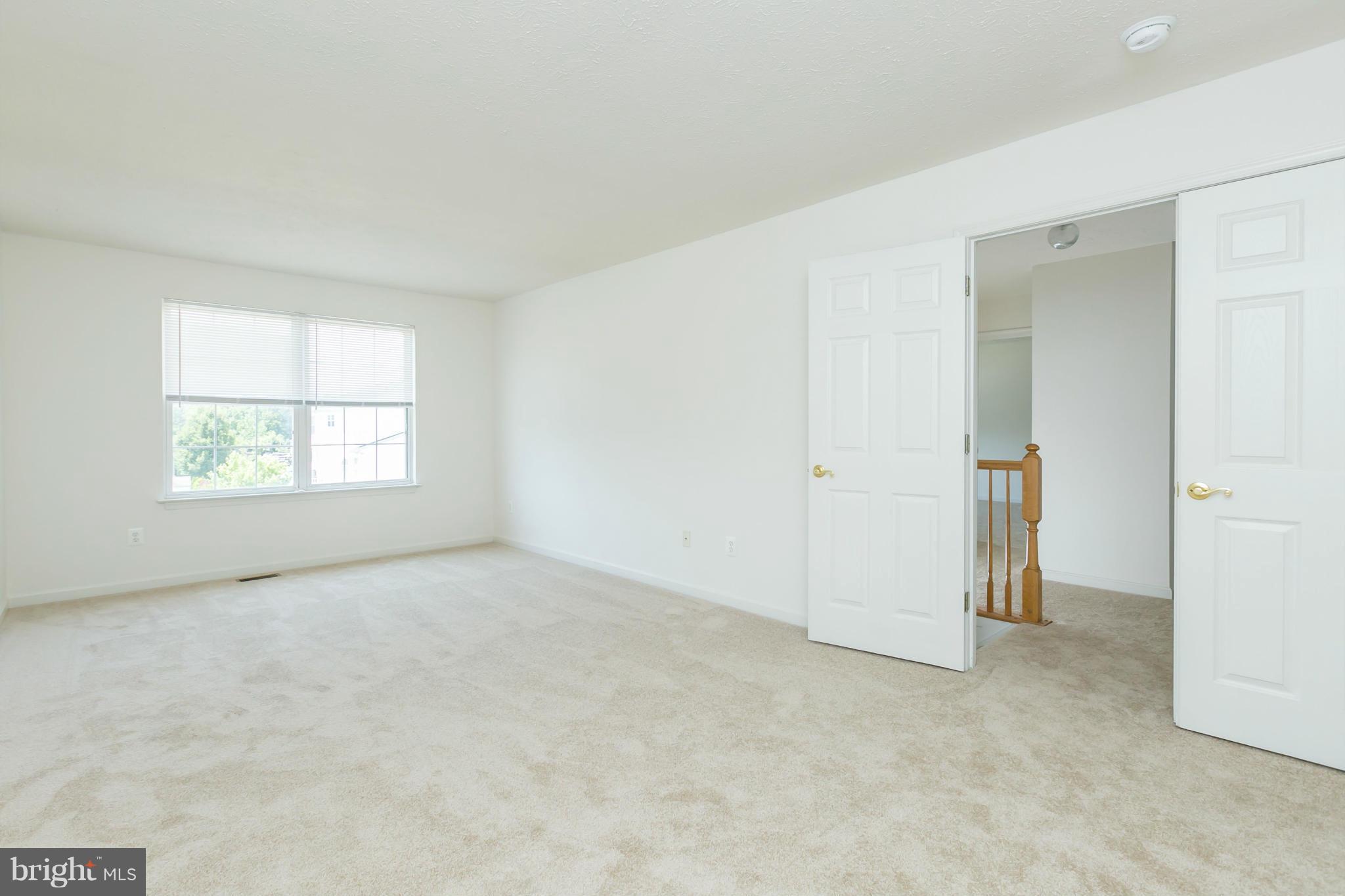 9302 Sea Point Road Baltimore, MD 21219 - Photo 14 of 30 an empty room with windows
