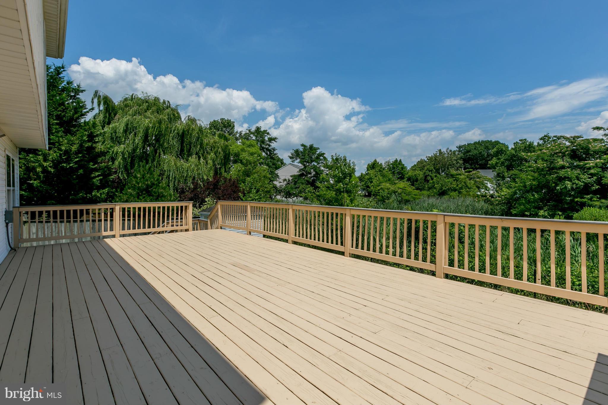 9302 Sea Point Road Baltimore, MD 21219 - Photo 28 of 30 a view of a balcony with wooden floor